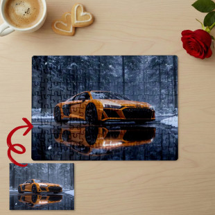 Пазл з фото Audi R8 на фоні зимового пейзажу